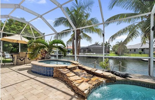 Pelican House | Waterfront retreat with Pool and Hot Tub