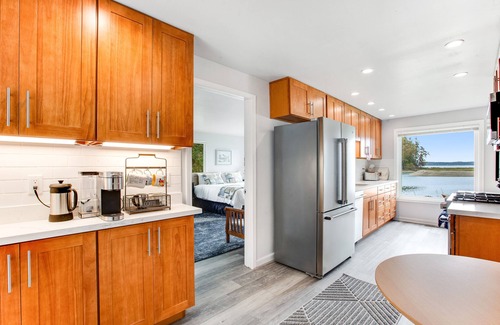 Lakebay House | Waterfront retreat with private beach, cookhouse, hot tub, EV charger, & firepit