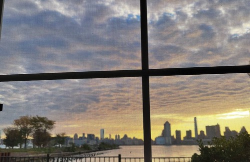 The Waterfront Apartment | Waterfront room in Downtown, Jersey City with Manhattan Skyline views