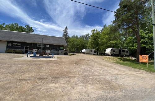 Barbeau RV Rental | Waterfront RV site A Full Hook-up with Dock
