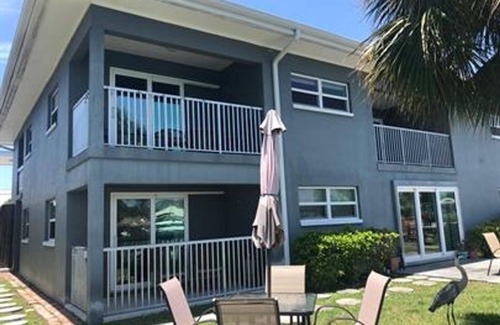 Capri Isle Apartment | Waterfront Treasure Island Apartment w/Private Patio, Dock & John’s Pass Nearby