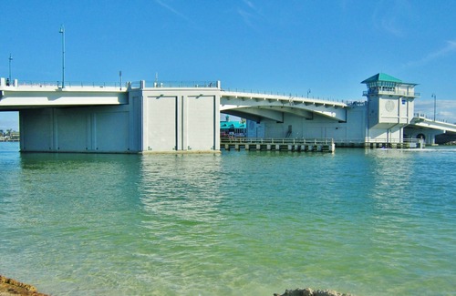 Capri Isle Apartment | Waterfront Treasure Island Apartment w/Private Patio, Dock & John’s Pass Nearby
