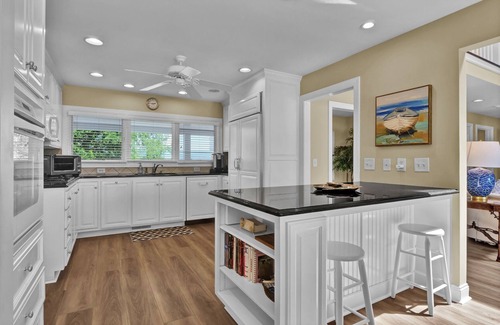 Shell Island House | Waterfront Retreat close to Beach Access, 2 Boat Slips, Hot Tub & Elevator