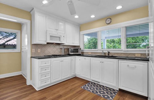Shell Island House | Waterfront Retreat close to Beach Access, 2 Boat Slips, Hot Tub & Elevator