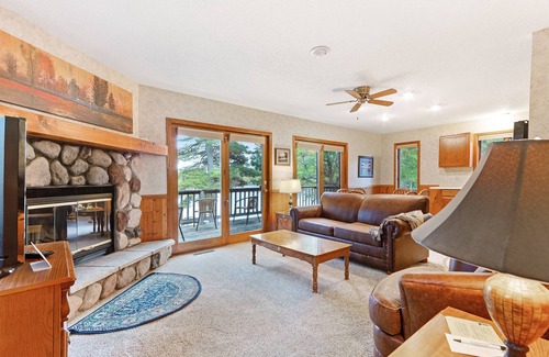 Eagle River Villa | Waterfront villa w/ fireplace, deck & shared tennis/game room - dogs welcome!