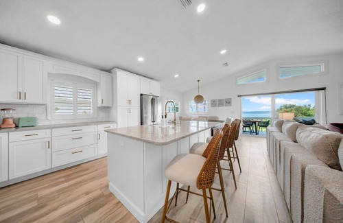 Crystal Beach House | Waterfront Villa w/Hot Tub Game Room Kayaks Bikes
