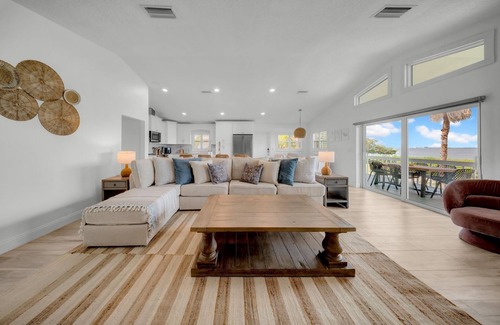Crystal Beach House | Waterfront Villa w/Hot Tub Game Room Kayaks Bikes