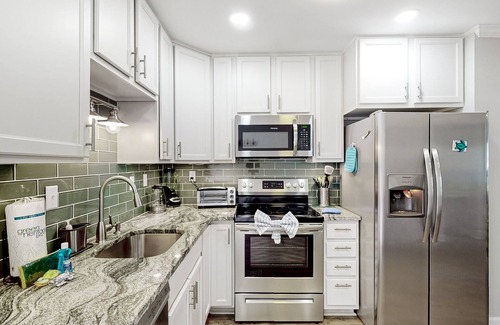 Palmetto Dunes Villa | Waterfront villa with resort amenities, beach access, open layout, AC, & W/D