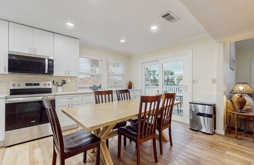 Holiday Isle Villa | Waterfront villa with multi level home, shared pool & easy beach access