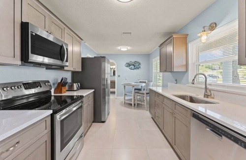 Convair Cove House | Waterfront w/Free Pets, Private Dock, Paddleboards, Pool Table, and 5 Smart TVs