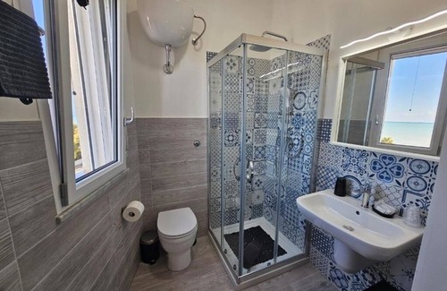 Porto Empedocle Apartment | Waterfront with Terrace. 5 Bedrooms and 5 Bathrooms. Ideal for Families and Groups.