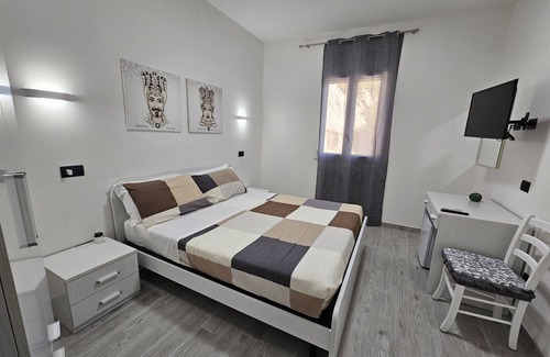 Porto Empedocle Apartment | Waterfront with Terrace. 5 Bedrooms and 5 Bathrooms. Ideal for Families and Groups.