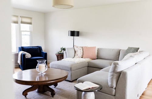 Fertility Cottage | Waterfront with Wood Fireplace + Outdoor Firepit + Paddleboat +1 mile to outlets