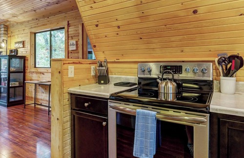 Wright City Cottage | Waterside Cottage w/Hot Tub by StayLage