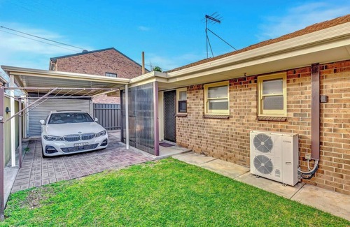 Glenelg North Apartment | Waves and Walks Close to Beach and Local Boutiques