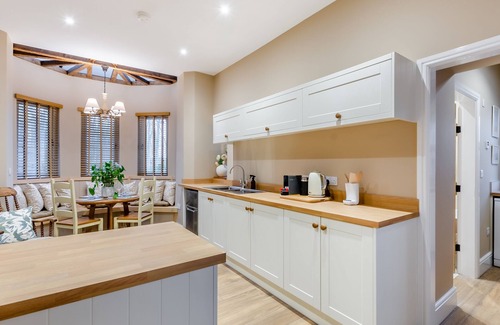 Driffield Cottage | We love this historic lodge with large garden and wood fired hot tub.