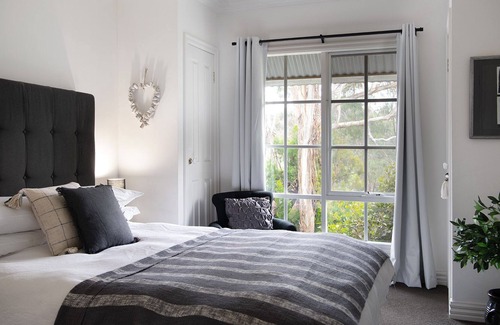 Hepburn Springs Apartment | Websters-Spa bath, gas log fire set amongst native bush land