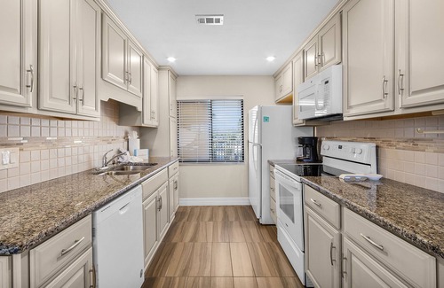 Mid Island Condo | Weekly Discount! 126 Charming Beachfront 2BR/2BA Condo w/Balcony