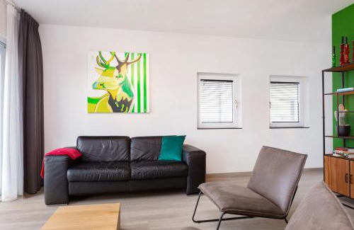 Offingawier Apartment | Welcome in - Beneden appartement direct aan het Sneekermeer met tuin