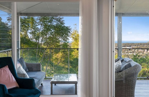 Coffs Harbour House | Welcome to Pacific Vista, a beautiful two-story home located in an idyllic nature setting.