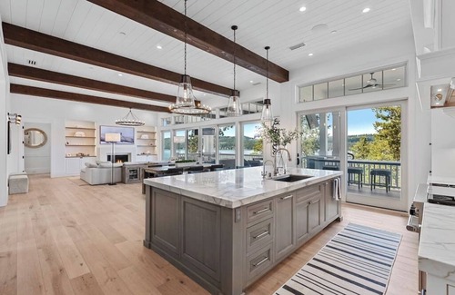 Harrison House | Welcome to The CDA Lakehouse at Pugh Point that offers tranquil luxury.