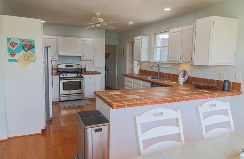 White Stone House | Welcome to The Cove - a spacious 6-bedroom house located in charming White Stone