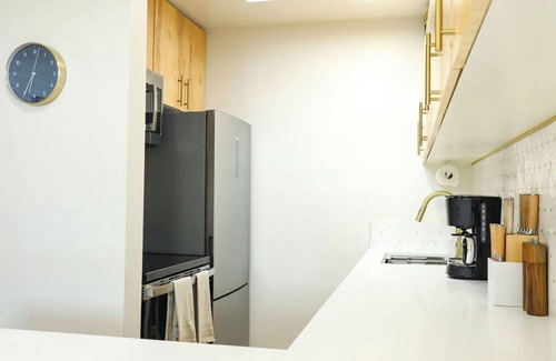 Mission Hills Apartment | Welcome to The Hillside Hideaway! This unique rental offers two separate units, perfect for two families or couples vacationing together who want their own private space. Step inside to discover a one-of-a-kind blend of mid-century retro-chic.