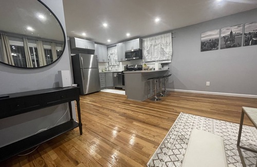 Queens House | Welcome to The Nest, your friend & family’s next NYC luxury retreat!