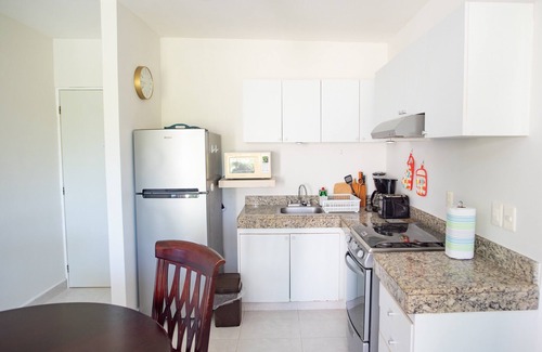 Progreso Municipality Condo | Welcome to this 1 bed 1 bath condo with splendid pool view