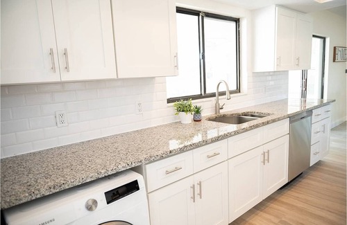 Belleair Shore House | Welcome to your private coastal getaway! This fully renovated 3-bedroom, 2-bath single family home is perfectly located on the Intracoastal Waterway—just a 2-minute walk to the sugar-white sands of Indian