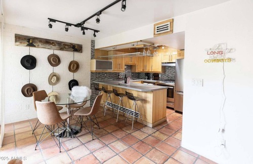 Entertainment District House | Welcome to your Charming Cowboy themed 2-bedroom townhome in Scottsdale, Arizona