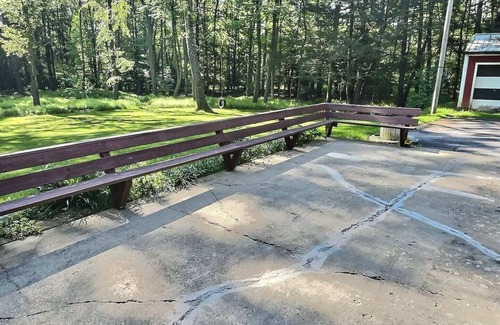 Brookville House | Welcome to your perfect getaway! Nestled on a semi-secluded 2-acre lot, this charming brick Cape Cod is centrally located between Cook Forest and Clear Creek State Parks. Surrounded by trees, this cozy retreat offers a peaceful escape.