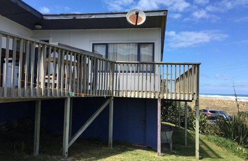 Glinks Gully House | West Coast Heaven. A rustic, cosy New Zealand bach.