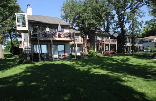 Spirit Lake Condo | West Lake Okoboji Rental. On the water with great green space.
