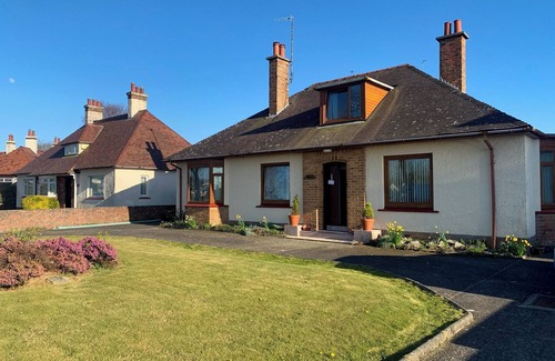 Stranraer Cottage | Where better to enjoy the hot tub in this delightful and private garden.