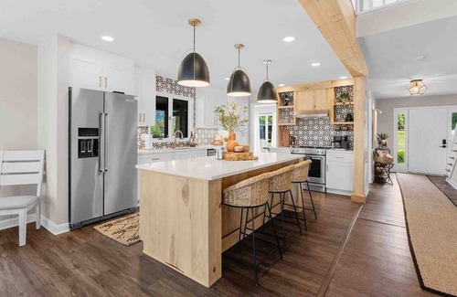 Mooresville Villa | Whiskey Sunsets: Stunning Peninsula Retreat with Panoramic Lake Views, Dock, Hot Tub, and More!