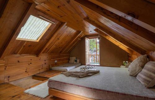 Banjar House | Whispering Pines Cottages Cabin by Bastiat Stays