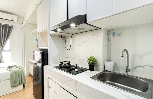 Serpong Apartment | White Tone Studio At Amazana Serpong Apartment