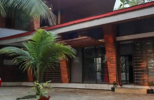 Navi Mumbai House | White Triangle by Joy Suitesnn