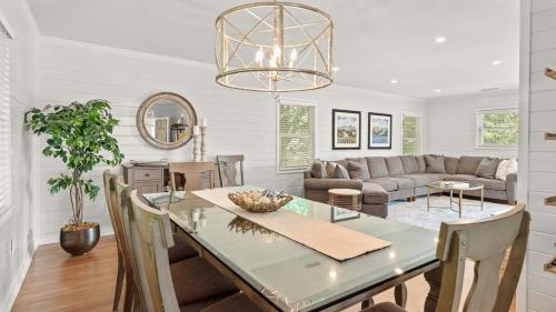 Pelican Bay House | Wild Dunes Gem Walk to Beach Pool Screened Porch Lounging