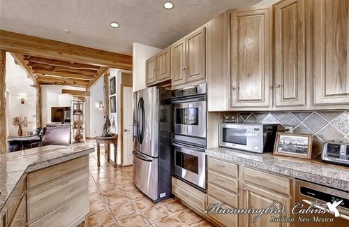 Alto House | Wild Horse Lodge: 'Amazing interior and room for all!' with hot tub.