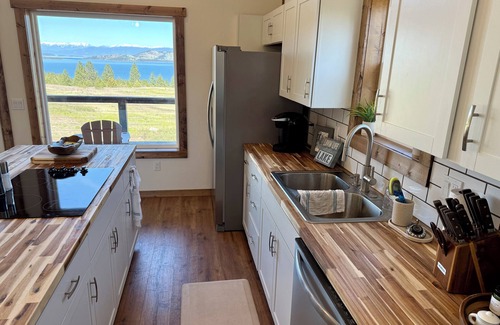 Big Arm House | Wild Horse Sunrise at Flathead Lake