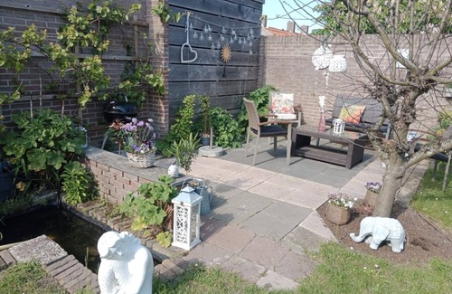 Westkapelle Apartment | Window view of the dunes! 10% weekly discount from August to December!