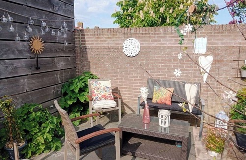 Westkapelle Apartment | Window view of the dunes! 10% weekly discount from August to December!