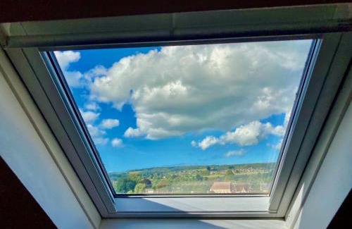 Stroud Apartment | Windows over Stroud - 2BR Penthouse in Historic Building