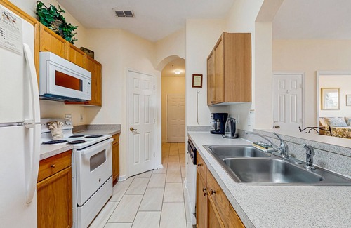 Windsor Palms House | Windsor Palms townhome with WiFi, AC, screened patio, pool, hot tub, & tennis