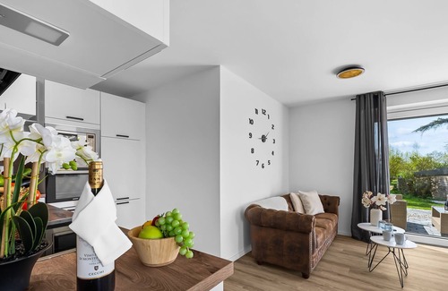 Schaalby Apartment | Winningmay III - Schleiblick, Duschbad, TV, EG mit Terrasse, 2 PKW-Stellplätze