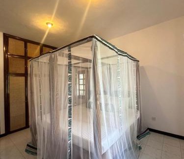 Malindi Apartment | Woburn Residences Condo by RevSerene