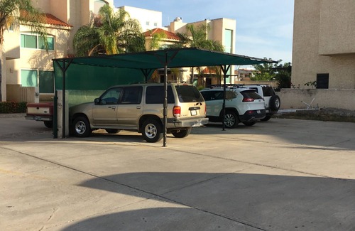 Las Gaviotas Condo | Wonderful bungalow in private tennis club located a block from Malecon and beach