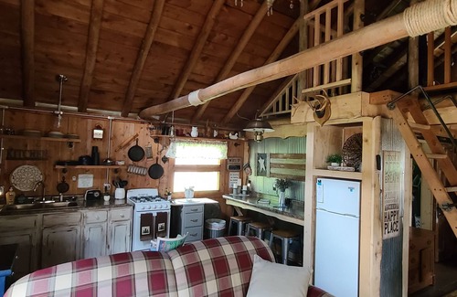 South Boardman Cabin | Wood Haven Lodge. Secluded, cozy log cabin in Northern Michigan.